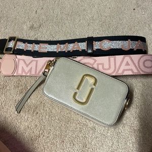 Perfect condition! Comes with two straps! Love, just too small for my needs.